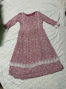 a pink and white flower printed dress