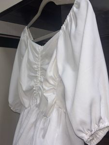 Coquette White Peplum Top