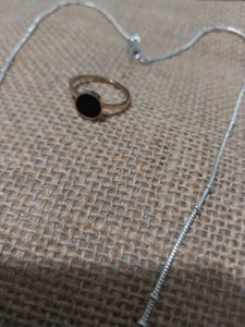 silver color pendant chain and rose gold chai