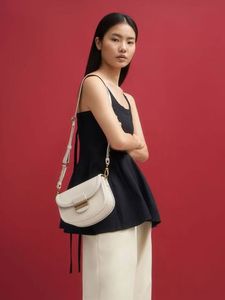 Charles &amp; Keith Embellished Saddle Bag