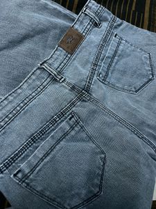 grey rough jeans