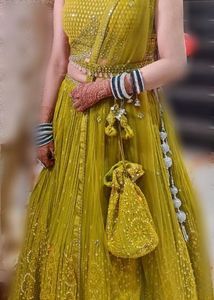 Gorgeous lime green Lehenga with pouch