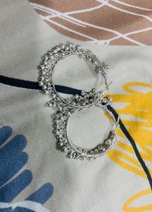 4 Silver Hoop Earrings with one ring