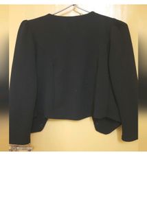 black colored crop jacket for women.Fabric cotton blend with front open style and buttons on.
