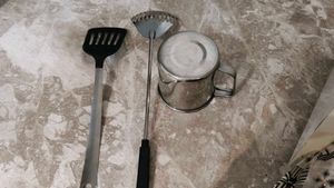 Small Jug With Two Frying Stick