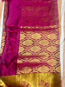 Orange kanchi Pattu Saree With Pink Pallu