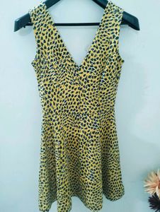 H&amp;M yellow and Black animal print skater dress.