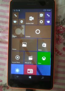 Microsoft Lumia 535, along with the charger