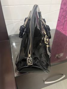 Black Versace Purse With Beautiful Broach
