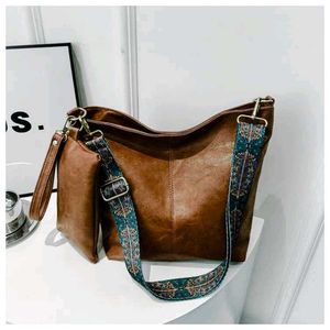 Grey Handbag with Colorful Strap