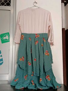 This Is A Flared Dress With Lily Print On It