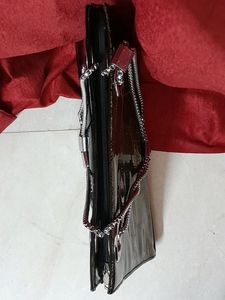 Black Handbag With Gold Detailing