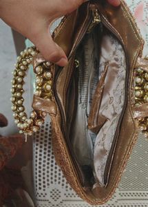 Elegant Clutch with Pearl Detail