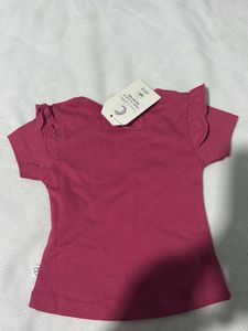 A Beautiful Pink Tee With  Shorts.