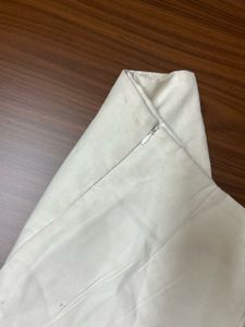 white skirt with a doll