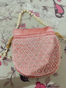 Regal Pink Pearl Potli Bag with Embellished Handle