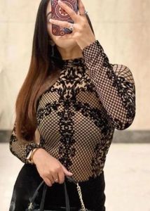 Nude And Black Mesh Bodysuit