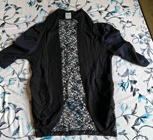 A Black Net Shrug