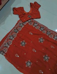 Elegant orange Embroidered Saree