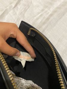black sling bag