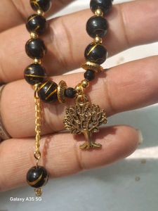 Black Beaded Bracelet with Tree Charm