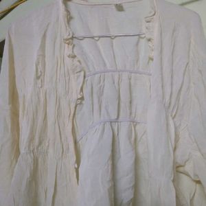 Cream Jacket with Ruffle Detail