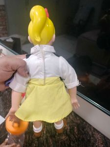 Vintage Blonde Doll with Bow