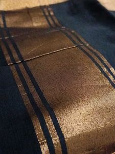 Black saree with golden sare