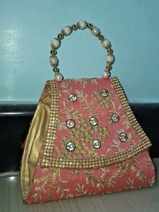 Elegant Pearl Handle Clutch