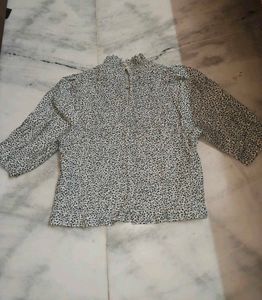 Smock top with flower detail