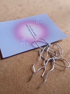Silver Bow Dangle Earrings