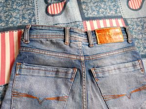 Distressed Wash Denim Jeans