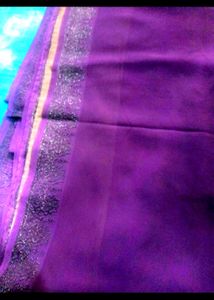 A Purple Colour Saree With Blouse