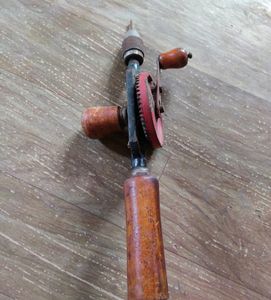 Old Hand Driller