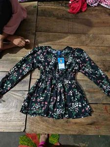 Black floral peplum top