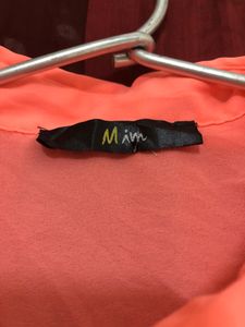 Mim Orange Sleeveless Top