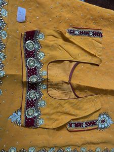 heavy work yellow red velvet border saree with blo