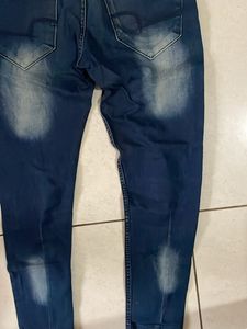 Distressed Denim Jeans