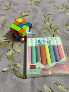 Rubiks Cube And Floating Pens