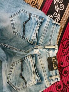 Stylish blue faded Killer jeans in good condition!