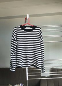 Striped long sleeve sweater.