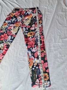Straight Pant Floral Print On Black Base.