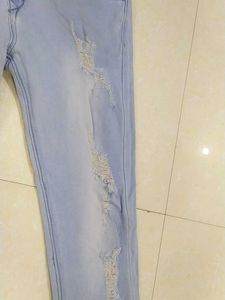 A Ripped Blue Jeans