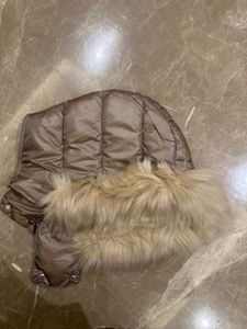 Light gold puffer jacket from Mango