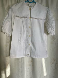 white top with collar