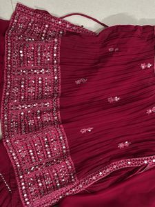 Red Mirror work lehanga with flared bottom and net