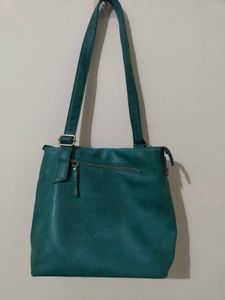 Fastrack Teal Sling Bag – Used, Good Condition