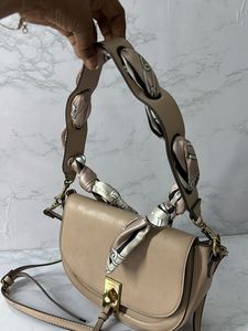 ALDO Ribbon Sling Bag