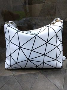 White Sling Bag.