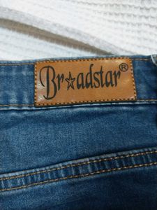 Distressed Blue Denim Jeans